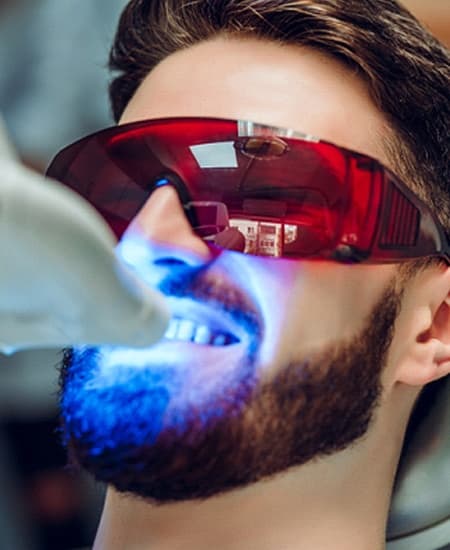 person getting their teeth whitened